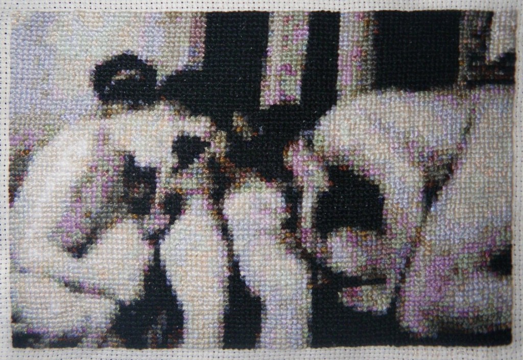 Lead-Emery-Masks-2011-embroidery-thread-and-aida-cloth-9.2-x-14cm-1